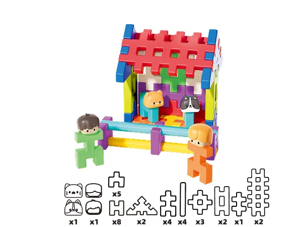 Parent and child sharing a joyful building moment on the floor
